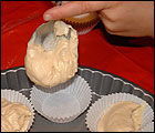 Picture: Spoon the mixture into cup cake cases