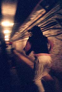 Song-Li, played by Amy Yamazaki, in the hotel basement