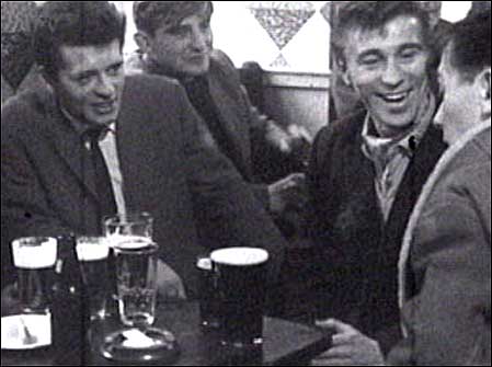Men drinking in pub