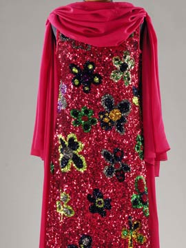 Biki burgundy chiffon and sequined evening gown, early 1970s, together with an evening clutch bag