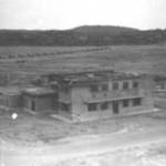 Flight Offices at China Bay, Trincomalee, Ceylon in 1942.  Hurricanes on the runway in background.