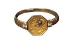 Gold ring found by a circus strong-man