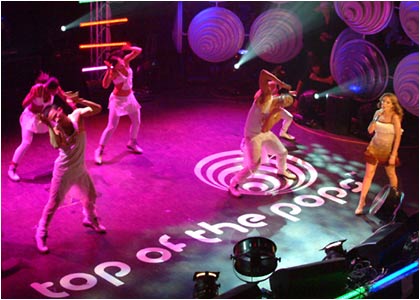 Kylie on stage at the R1 / TOTP Christmas Party