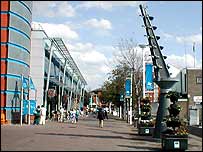Brayford Pool front with water  clock on the right and information board on the left.