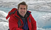 Dr Iain Stewart at a moulin on Jakobshavn glacier, Greenland