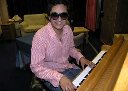 Raghav at the studio piano