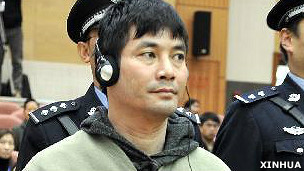 糯康在雲南昆明法院聽取二審裁決（新華社圖片26/12/2012）