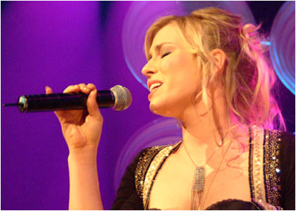Natasha Bedingfield on stage at the R1 / TOTP Christmas Party