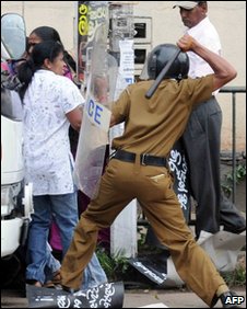 police batton charged protesters