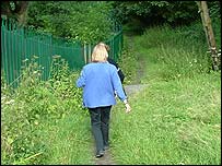 Walking along by the fence