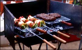 Pic: Food cooking on barbecue.