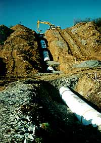 Pipeline being laid over a steep hill