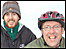 Two cyclists smiling.