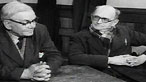 Two men at a table