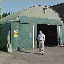 Andrew Morris outisde the hut which used to be a chapel at RAF Scampton.