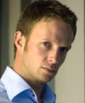 Adam Carter (Rupert Penry-Jones)