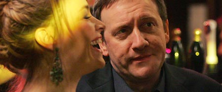 Eva Pope as Kathy and Neil Dudgeon as Harry