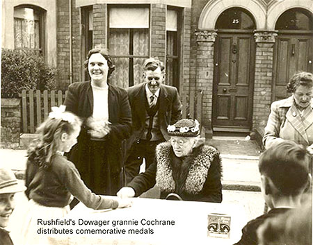 Grannie Cochrane presents some medals