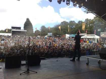 Steve introduces a band on the main stage