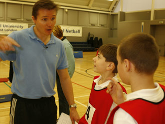 Roger talks tactics with Andrius and Micheal