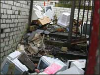 Passengers share the station with dumped computers