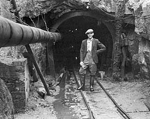 Sam McMurray, the contractor's engineer   standing at the Dunnywater entrance in 1950