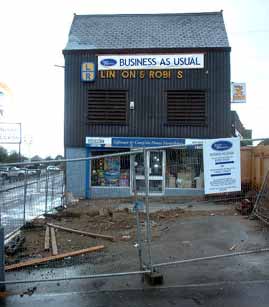 Outside the shop it is clear that work on  the store's redevelopment is underway (2004)