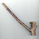Trapped by snow, a party of British Troops were befriended by local Italians.  When the cigarettes ran out, an Italian cut off a small branch and carved out a pipe bowl and then with a heated knitting needle made a hole through the ‘stem’. The result — a working pipe!
