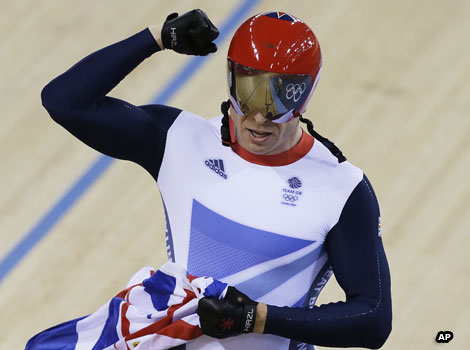 British cyclist Sir Chris Hoy celebrates winning the London 2012 track sprint event.
