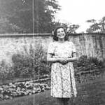 Wounded in action!  Elaine in one of the American dresses (but not the favourite one!) Edinburgh 1944/45
