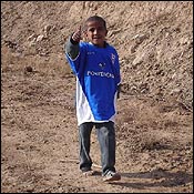 Iraqui child wearing Ipswich Town shirt
