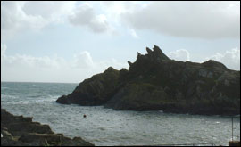 Rocks lead out to the sea