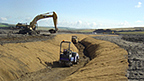 Artificial channel of the River Nith under construction.