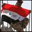 پرچم عراق بر فراز قصر بصره