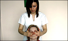 Sarah Bland having a head massage.