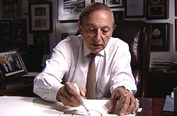 Dr Robert Gallo, showing how HIV attacks cells of the immune system.