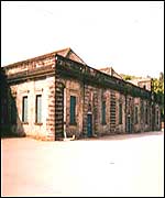 Sludge disposal building