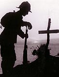 Allied soldier mourns a lost comrade