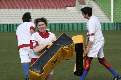 The team practise using pads