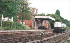 Rowden Mill is a superbly restored station on the former Leominster to Worcester line.   After closure in 1952 the station lay derelict until 1984.   A great deal of work by the Wilkinson family went into restoration.   At the platform stands GWR Inspection Saloon W80976.   The station area is strictly private.  (Leslie Oppitz )