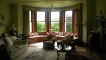 The bay window within the main guest room