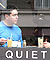 Two men sitting in a cafe window