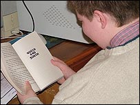 Tom reading Red Moon