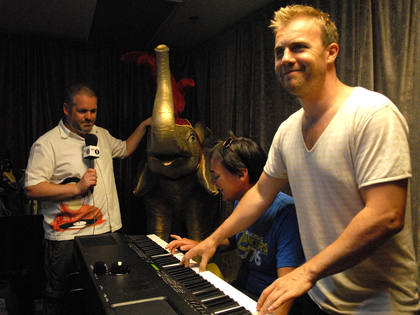 Dave and Gary enjoy a tinkle on the piano. Is that the quiz elephant in the background?