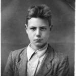My passport photo in 1946 in my best clothes, aged 16. I had forgotten how to smile. My passport photo in 1946 in my best clothes, aged 16. I had forgotten how to smile.