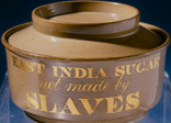 An earthenware sugar bowl with the words 'East India Sugar Not Made by Slaves' inscribed on the side