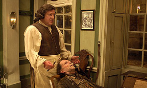 Ray Winstone and David Bradley as Sweeney Todd and his father