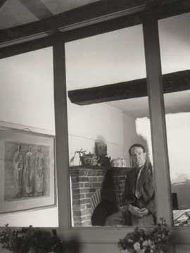 Moore in the small sitting room in September 1946, photo by F.J. Goodman © The Henry Moore Foundation. This image must not be reproduced or altered without prior consent from the Henry Moore Foundation.