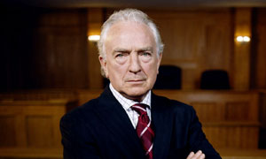 Paul Freeman plays Laurence Scammell QC