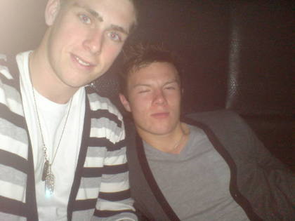 Two men in cardigans. Nice